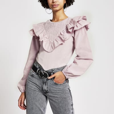 Pink long sleeve frill front blouse
