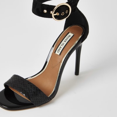 Black embossed barely there heeled sandals