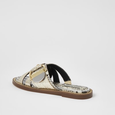 Gold cross strap ring flat sandals