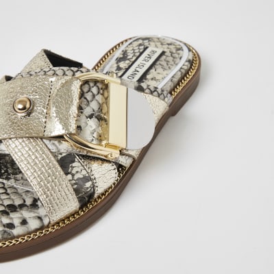 Gold cross strap ring flat sandals