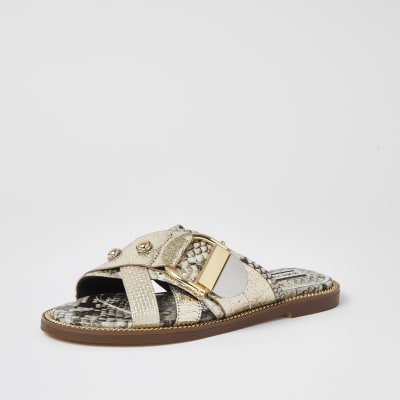 Gold cross strap ring flat sandals