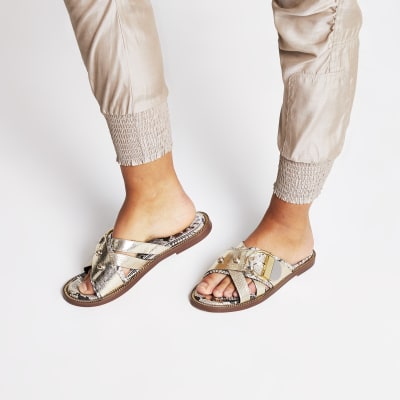 Gold cross strap ring flat sandals