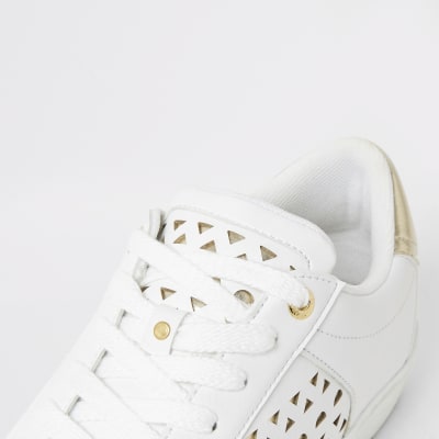 White cutout lace-up trainers