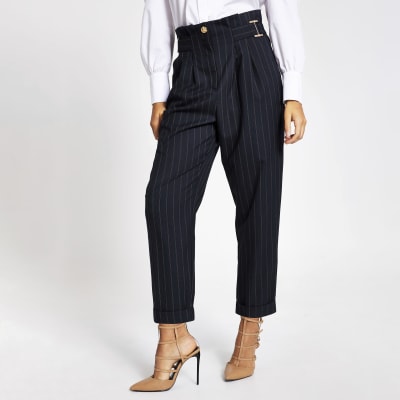 Navy pinstripe buckle peg leg trousers