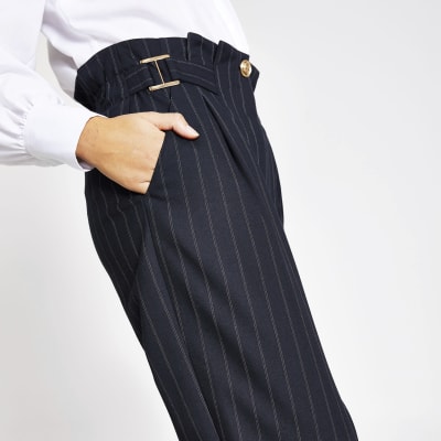 Navy pinstripe buckle peg leg trousers