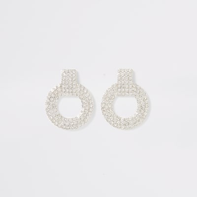 Clous d'oreilles argentées en cercle avec strass