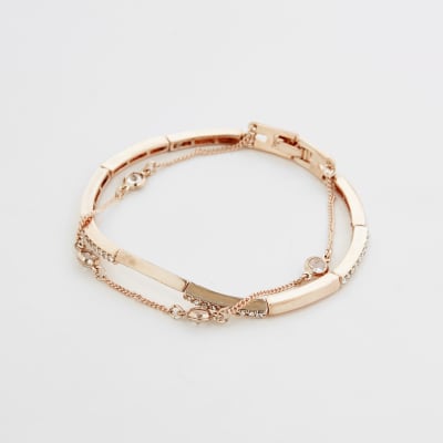 Goudkleurige gelaagde armband met siersteentjes