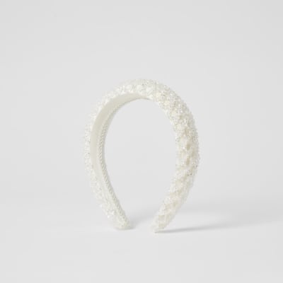 Serre-tête blanc matelassé orné de perles