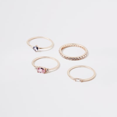 Set van 4 roségouden gelaagde ringen met juwelen en siersteentjes