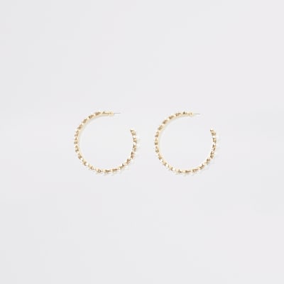 Goudkleurige ronde oorbellen met parels en siersteentjes