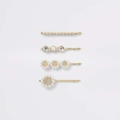 Lot de 4 barrettes dorées ornées de perles
