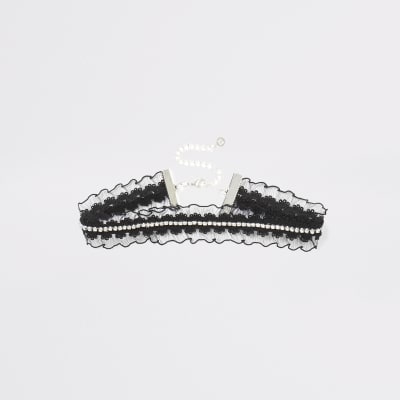 Ras-du-cou noir en dentelle à volants et strass 