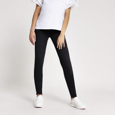 Zwarte Amelie zwangerschapsjeans met tailleband onder de buik