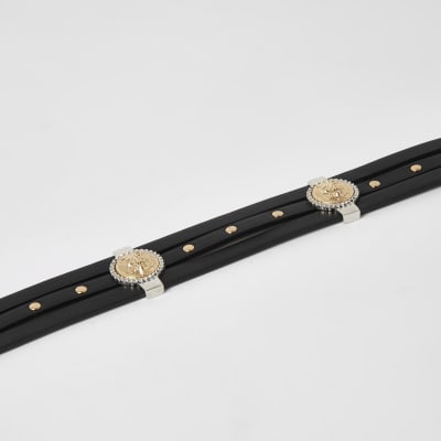 Ceinture noire ornée de têtes de lion