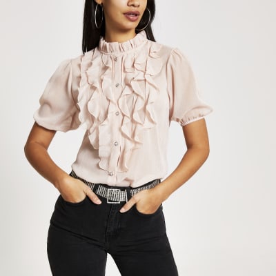 Roze top met ruches voor en korte mouwen