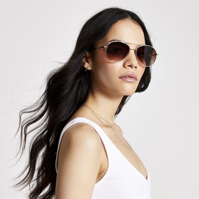 Gold snaffle arm aviator sunglasses