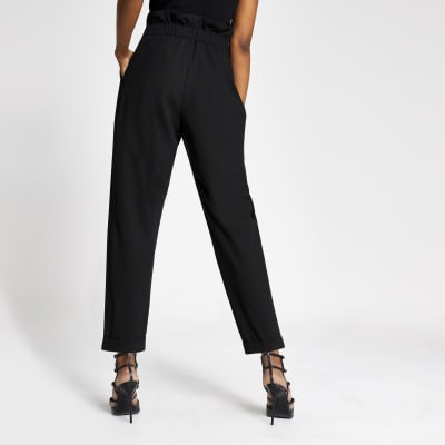 Black buckle waist peg leg trousers