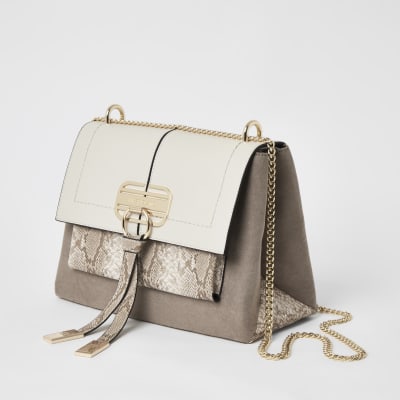 Donkerbeige crossbodytas met slot voorop