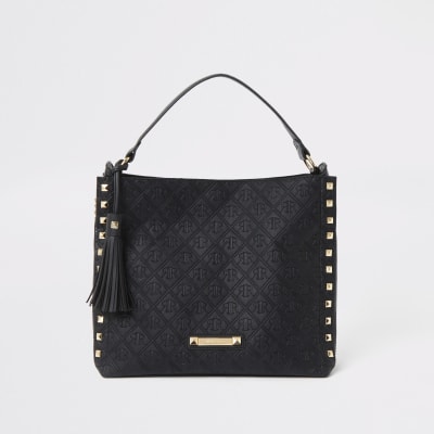 Sac souple noir avec chaîne à monogramme RI