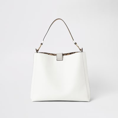 Graue Beuteltasche mit Quaste und Fronttasche