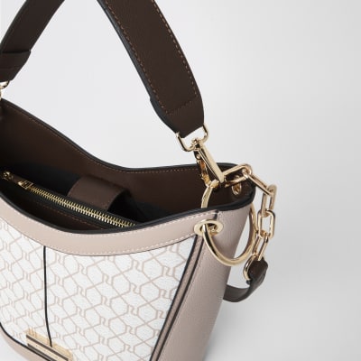 Roze diepe crossbodytas met RI-monogram
