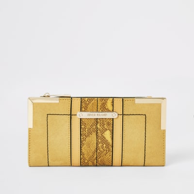 Portefeuille en suédine jaune à rabats et coins métalliques