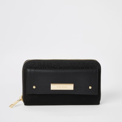 Portefeuille noir zippé à paillettes avec poche sur le devant