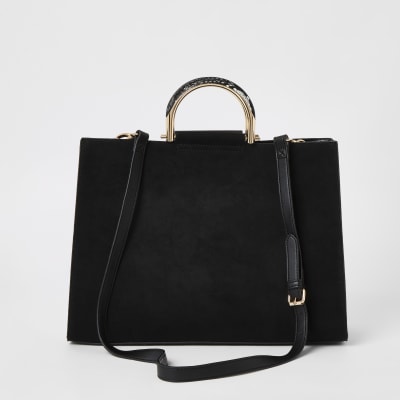 Schwarze Tote Bag mit Nieten und Cut-out