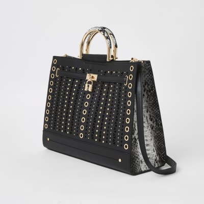 Schwarze Tote Bag mit Nieten und Cut-out