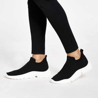 Baskets de course en maille noires avec semelle fendue