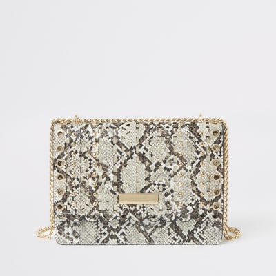 Beige cutout stud cross body satchel bag