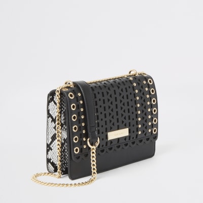 Black cutout stud cross body satchel bag