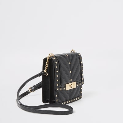 Black studded quilted cross body bag