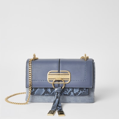 Sac bandoulière bleu imprimé serpent avec fermoir sur le devant