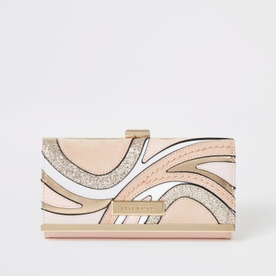 Roze glitterportemonnee met clipsluiting, wervelprint en uitsnede