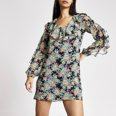 Schwarzes Swing-Kleid mit Rüschen, Blumen-Muster und durchsichtigem Ärmel