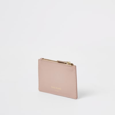 Porte-cartes en cuir rose zippé