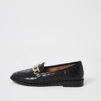 Zwarte loafers met studs en krokodillenreliëf