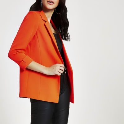 Oranje blazer met omgeslagen mouwen