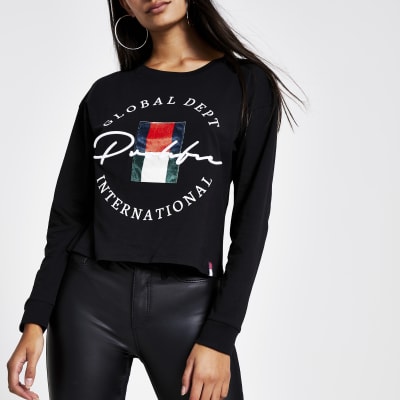 Prolific - Zwarte crop top met print en lange mouwen