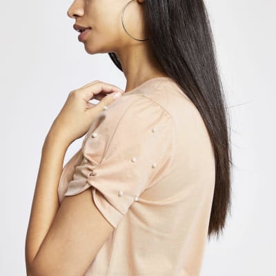 Beige verfraaid aansluitend T-shirt met knoop in de mouwen