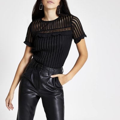 Zwart T-shirt met korte mouwen en broderie kant