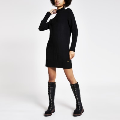 Schwarzer Longline-Pullover aus Strick mit hohem Kragen