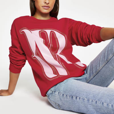 Rode oversized pullover met studs en RVR-print