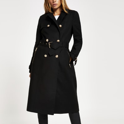 Zwarte trenchcoat met dubbele knopenrij en ceintuur