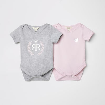 Set van twee babyroze rompertjes