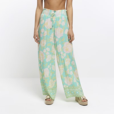 Aqua print palazzo trousers | River Island