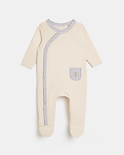 Baby beige RI cross over sleepsuit