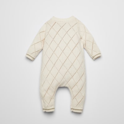 knitted baby grow