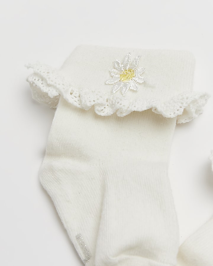 Baby girl cream daisy socks
